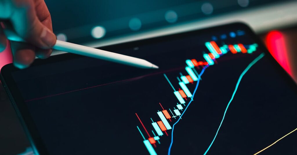 Close-up of cryptocurrency trading analysis on a digital tablet, highlighting market trends.